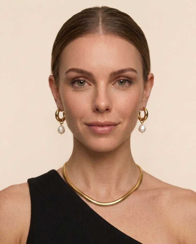 Woman wearing gold jewelry 