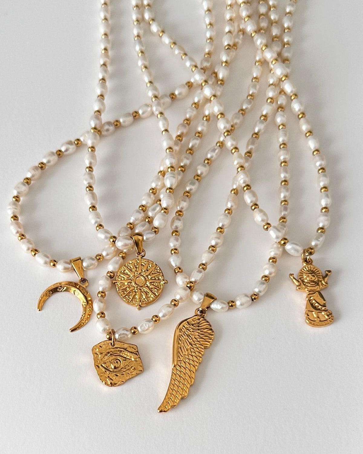 gold-totem-pendant-freshwater-pearl-necklace-collection